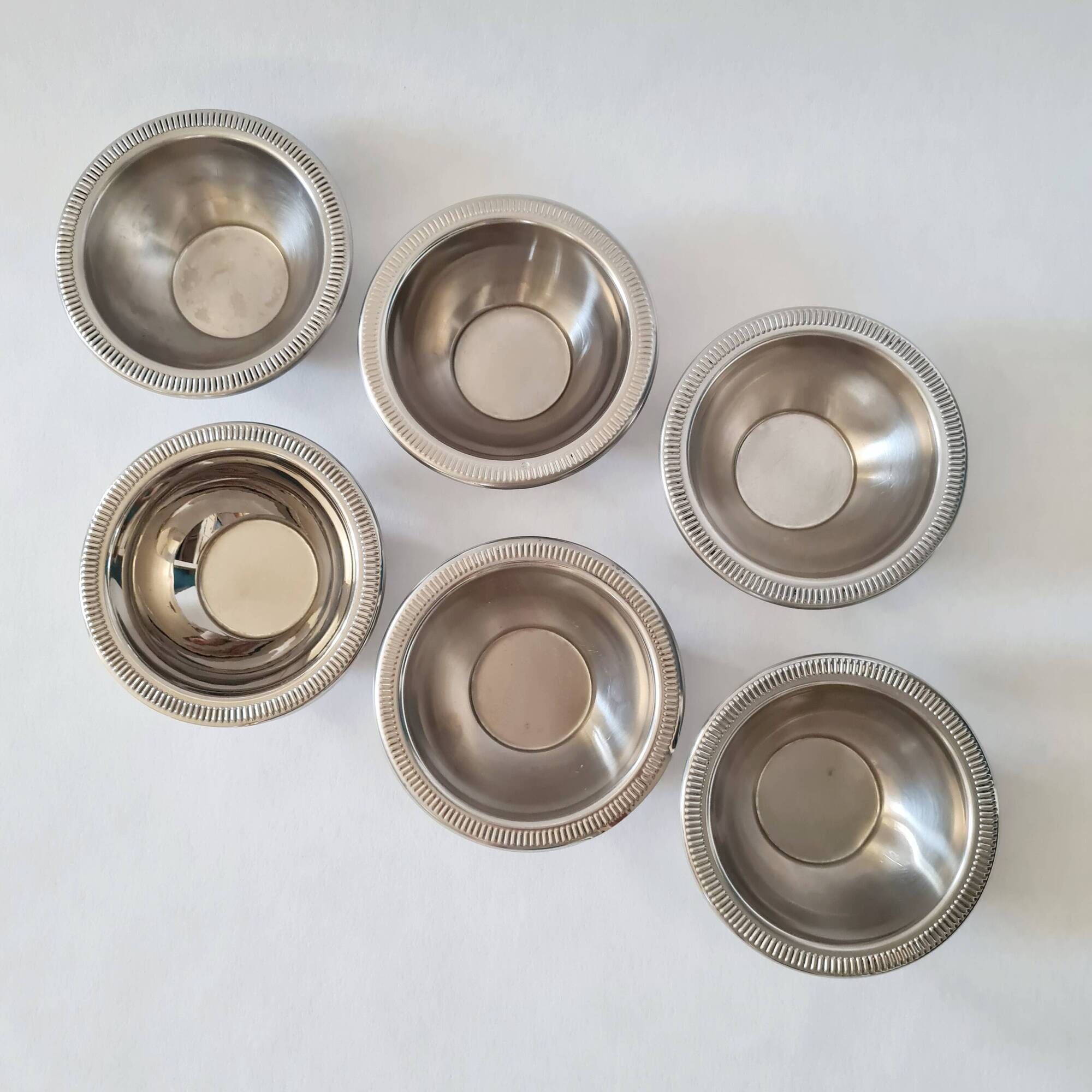 Set of 6 small vintage stainless steel bowls.