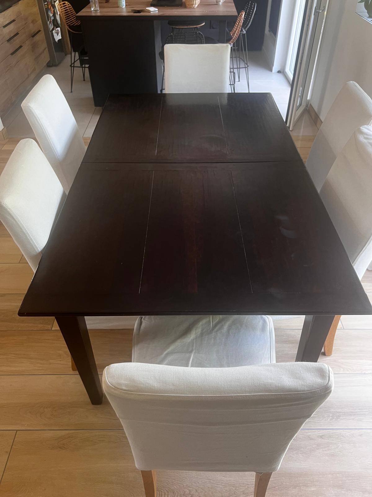 Solid cherry wood dining table, extendable for 8 to 12 people.