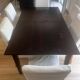 Solid cherry wood dining table, extendable for 8 to 12 people.