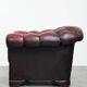 Classic cowhide Chesterfield button seat armchair in a beautiful red colour