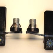 Pair of wall lights from the 1950s-1960s with a push button switch.