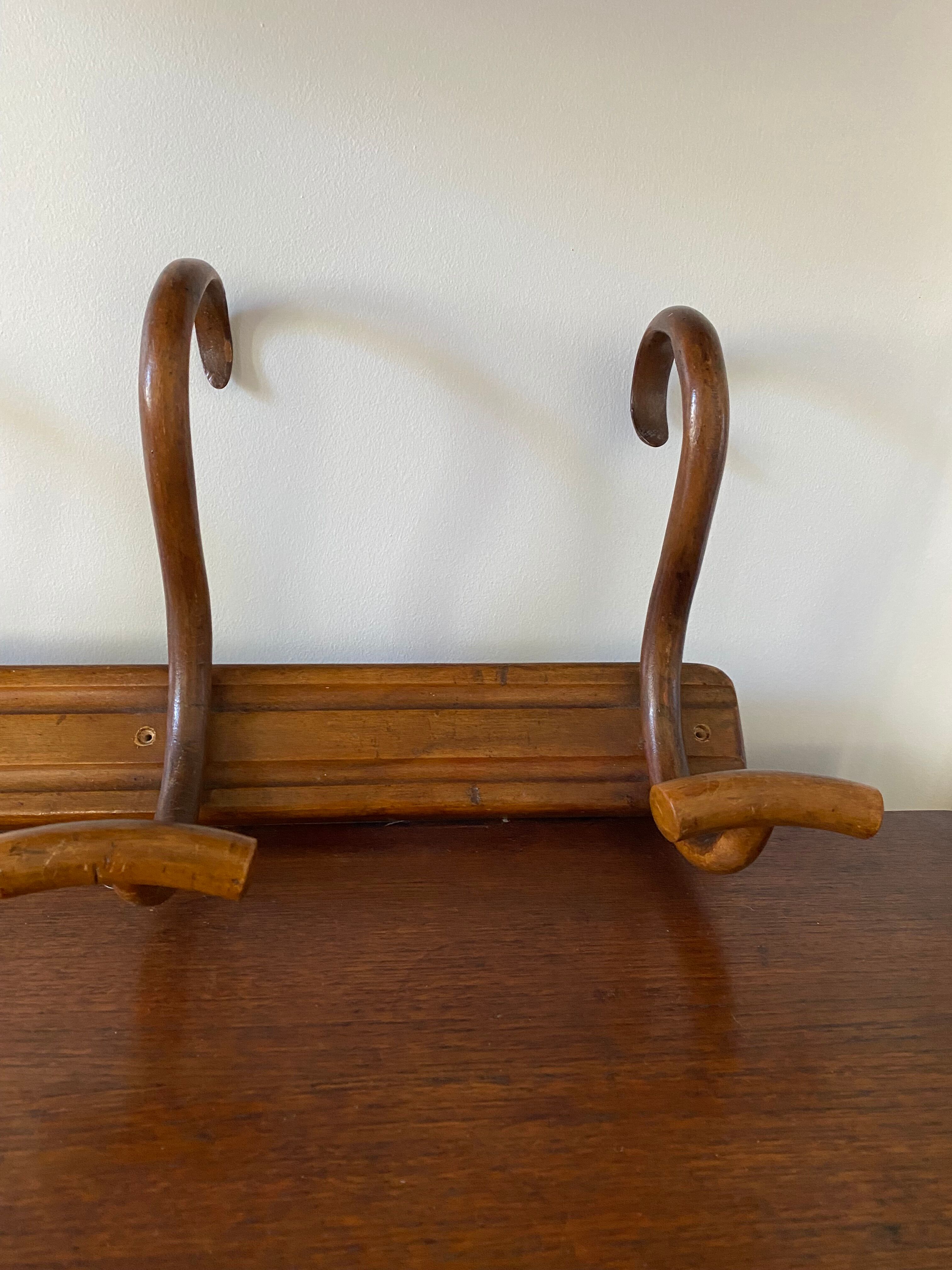 Wooden coat rack turned upside down