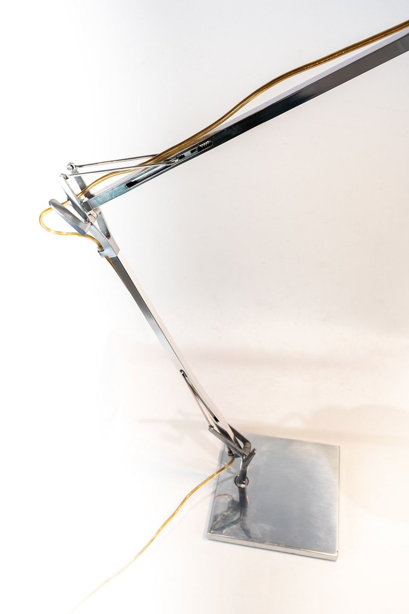 Table lamp of stainless steel and of italian design by Flos