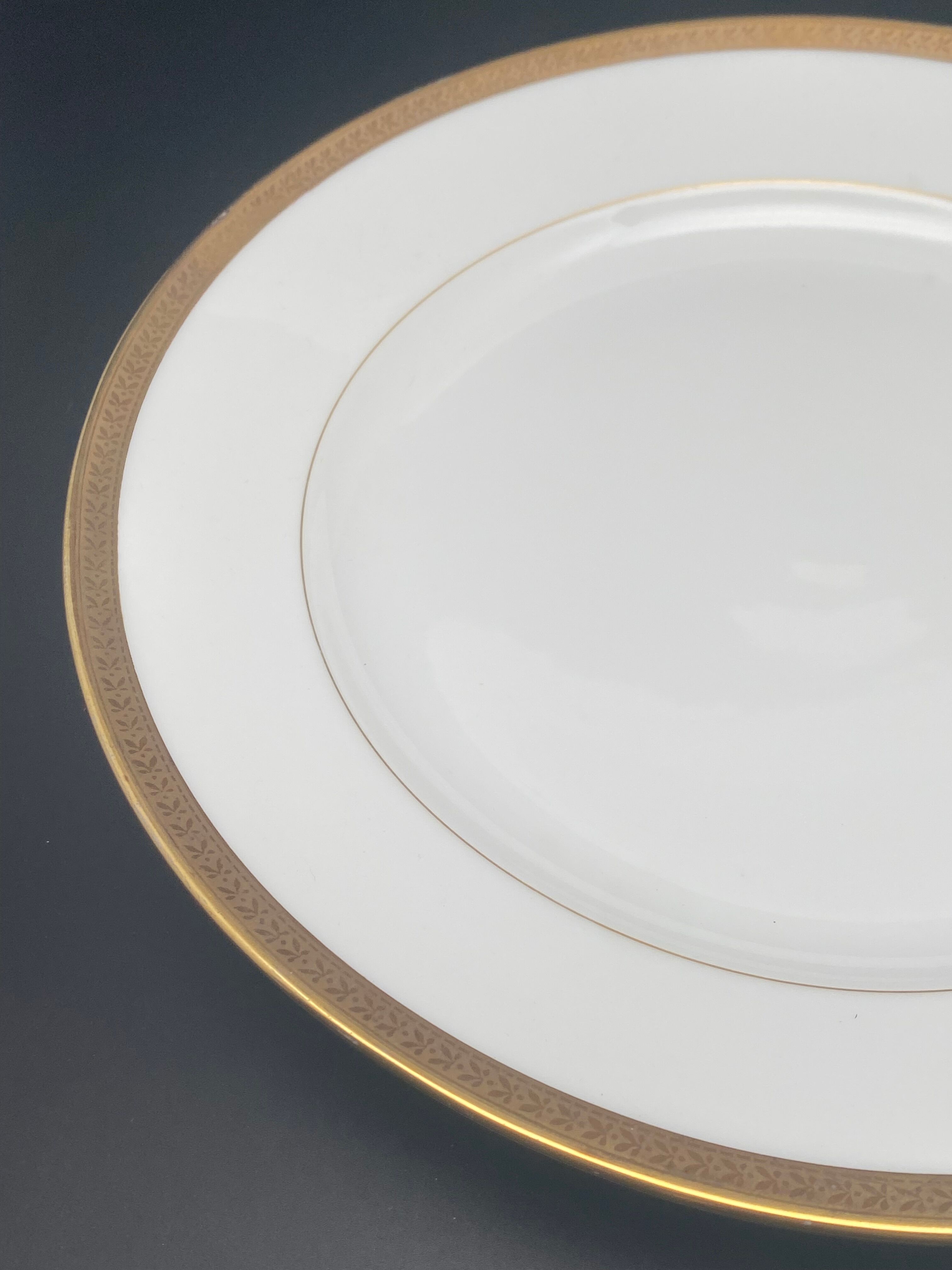 Round porcelain dish from Limoges golden tower