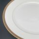 Round porcelain dish from Limoges golden tower