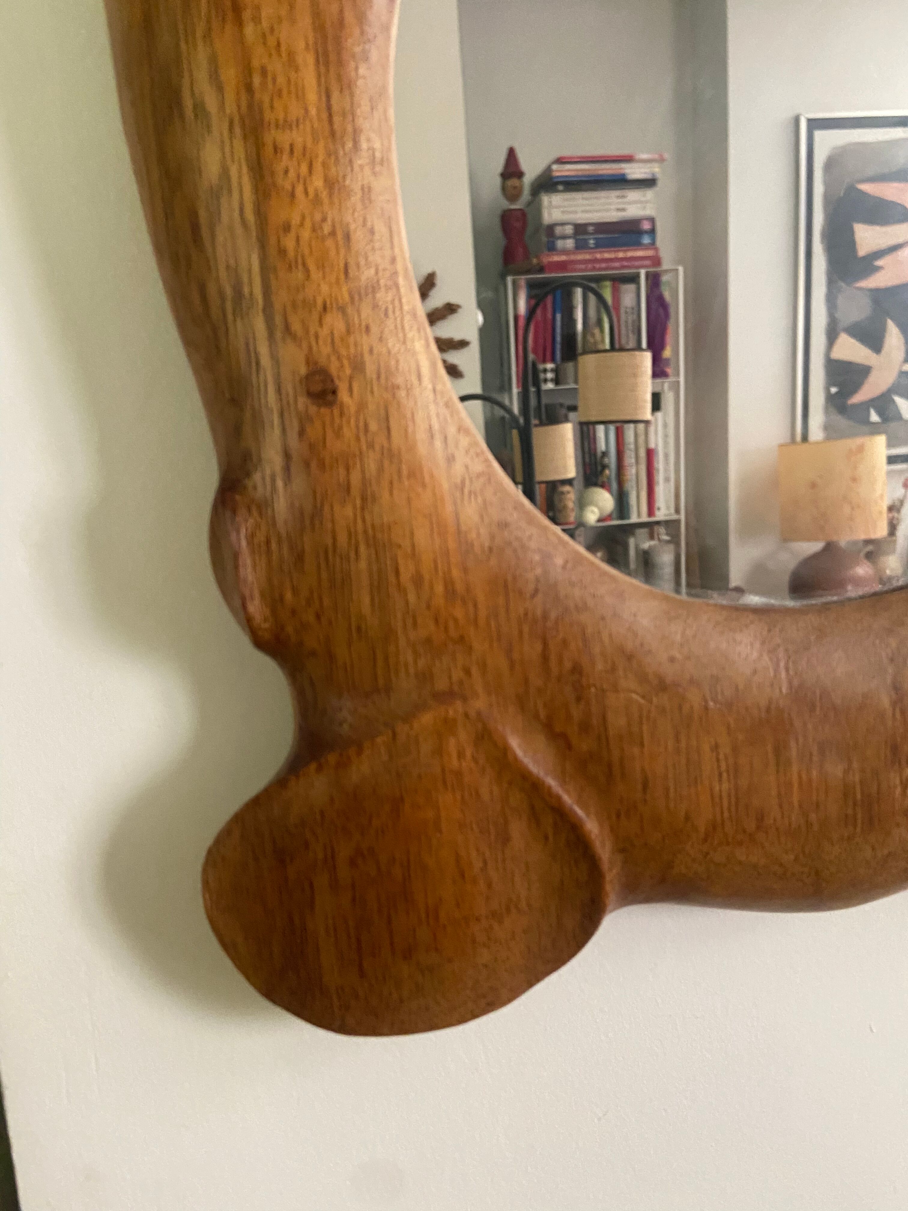 Polymorphic mirror in vintage wood