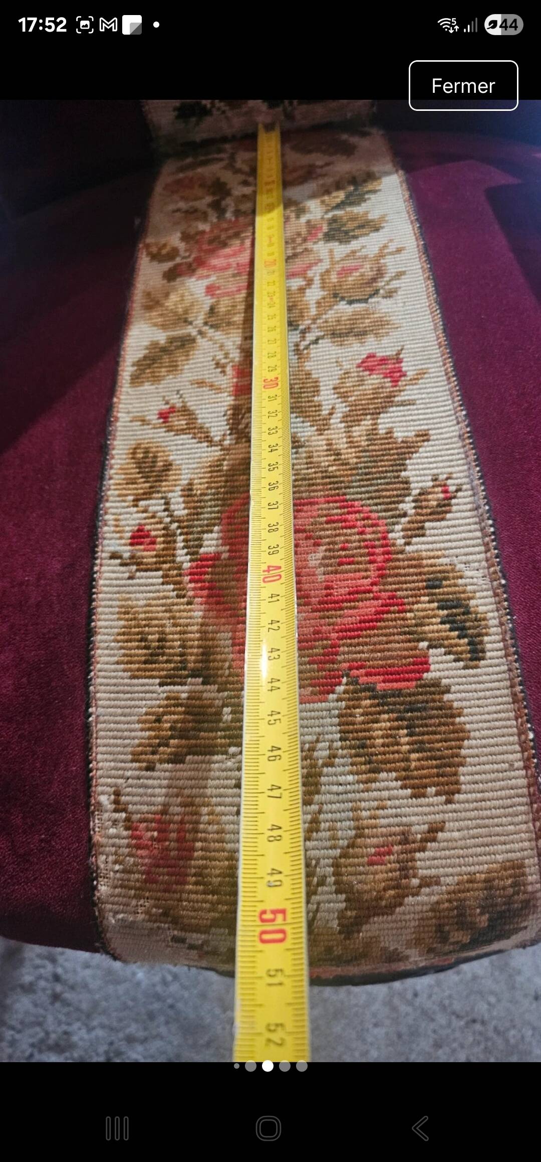 Louis-Philippe armchair in mahogany and burgundy velvet, floral decoration.