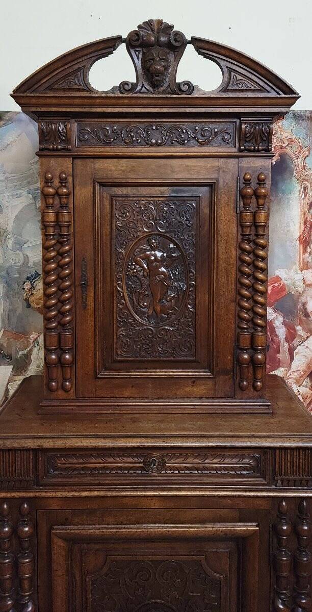 Antique solid walnut piece of furniture, finely carved, in Renaissance style.