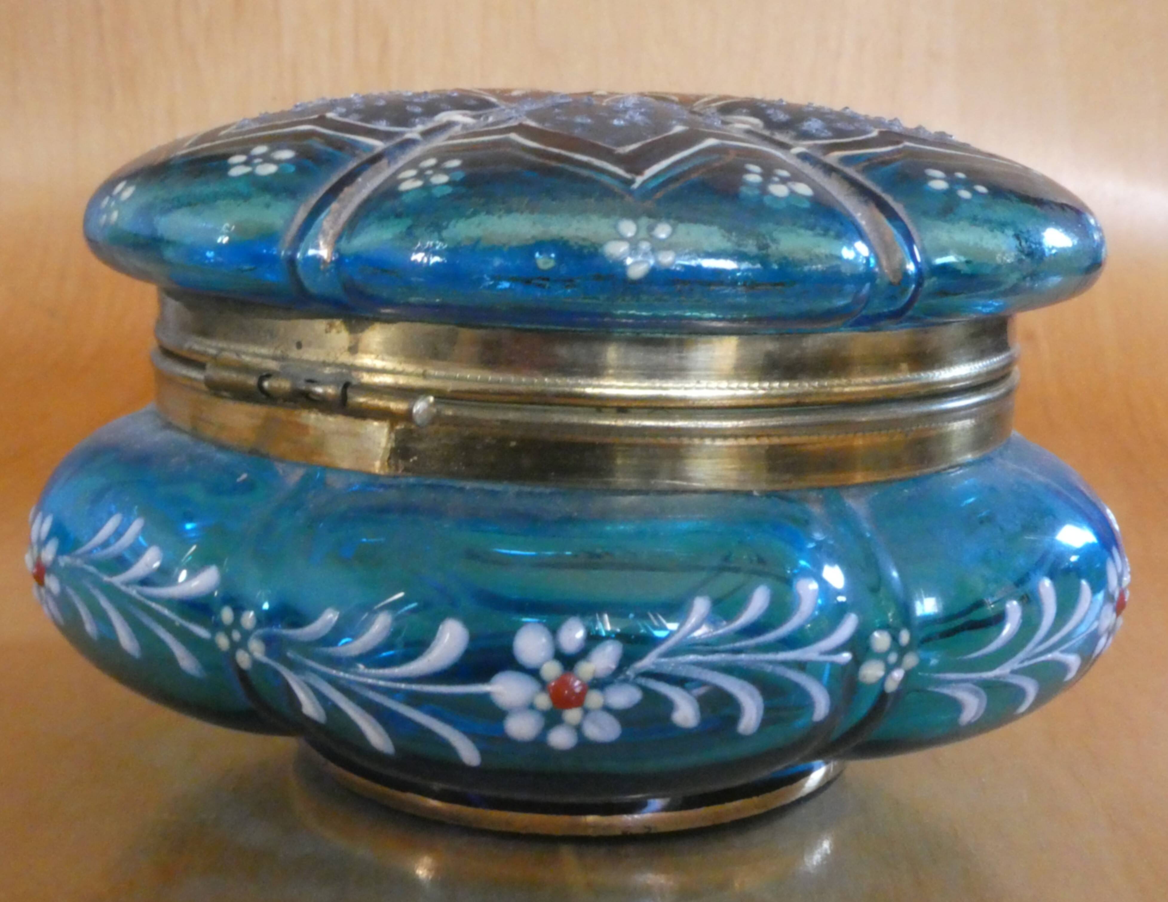 Turquoise glass box, beautifully decorated with gold motifs
