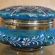 Turquoise glass box, beautifully decorated with gold motifs