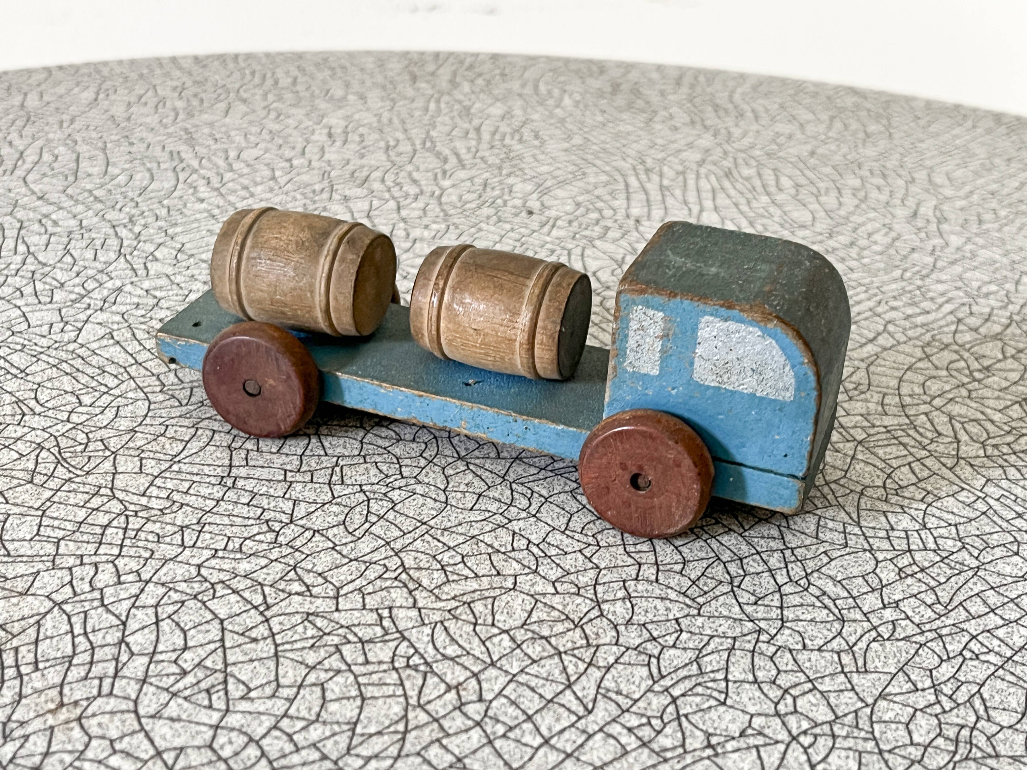 Small barrel transporter truck, antique waxed wooden toy