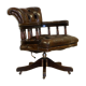 Restored Chesterfield captain's armchair in leather with an oak frame.