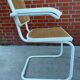 Cesca Chair model with armrest in white