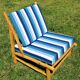 Low armchair in eucalyptus wood with blue and white cushions