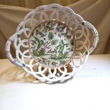 Old woven and openwork earthenware basket, with painted decoration in the center, probably 18th century