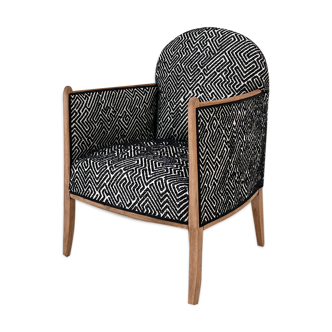 Club armchair in wood and fabric.