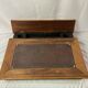 Old wooden writing board over leather early twentieth century