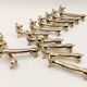 12 vintage silver metal cat knot knife rests