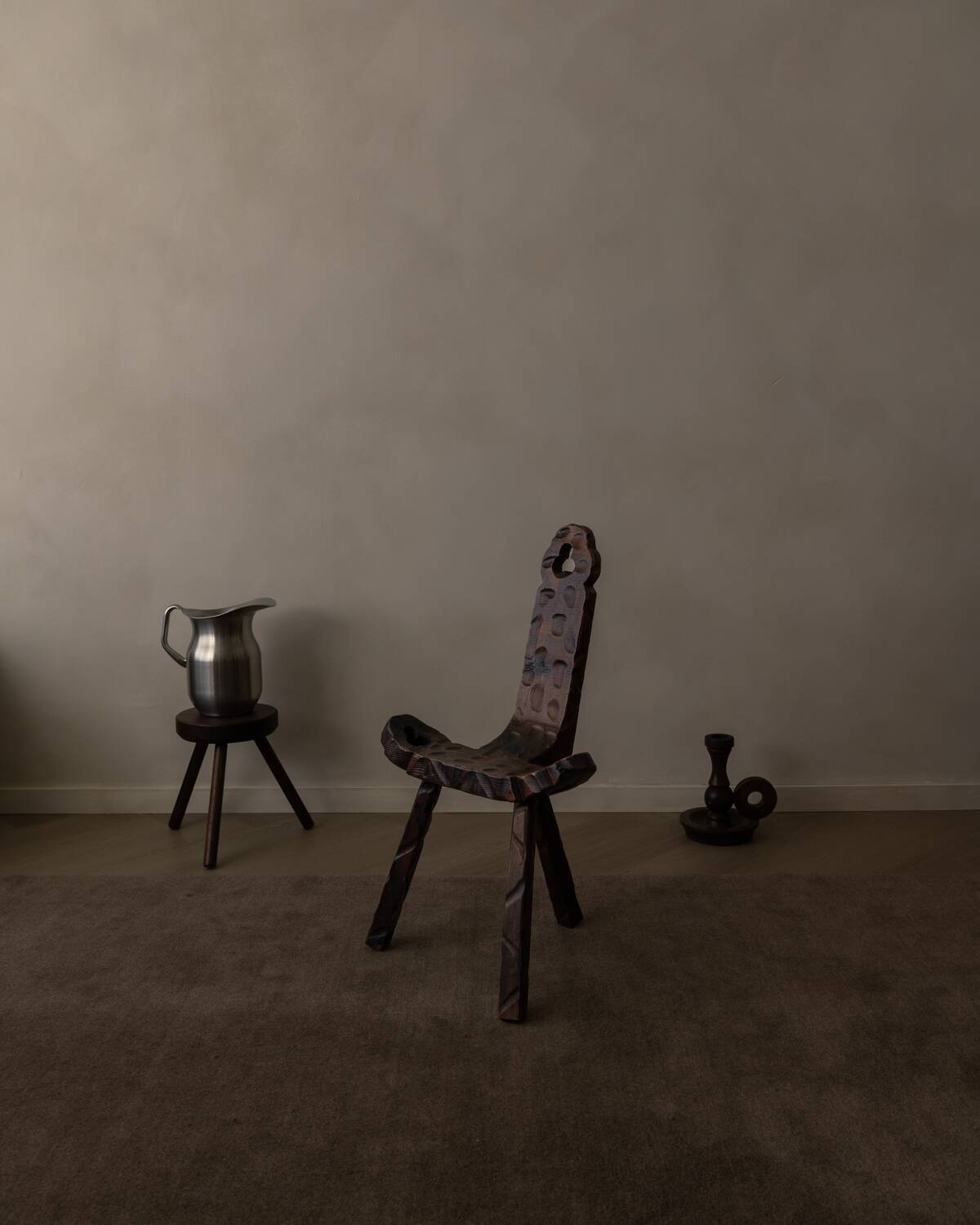 Spanish brutalist tripod chair in carved solid wood