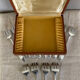 Art Deco oyster forks in punched silver metal, leatherette box