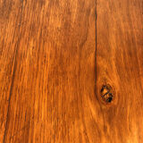 Round pedestal table in fruit wood