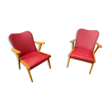 Pair of bridge armchairs with compass legs.