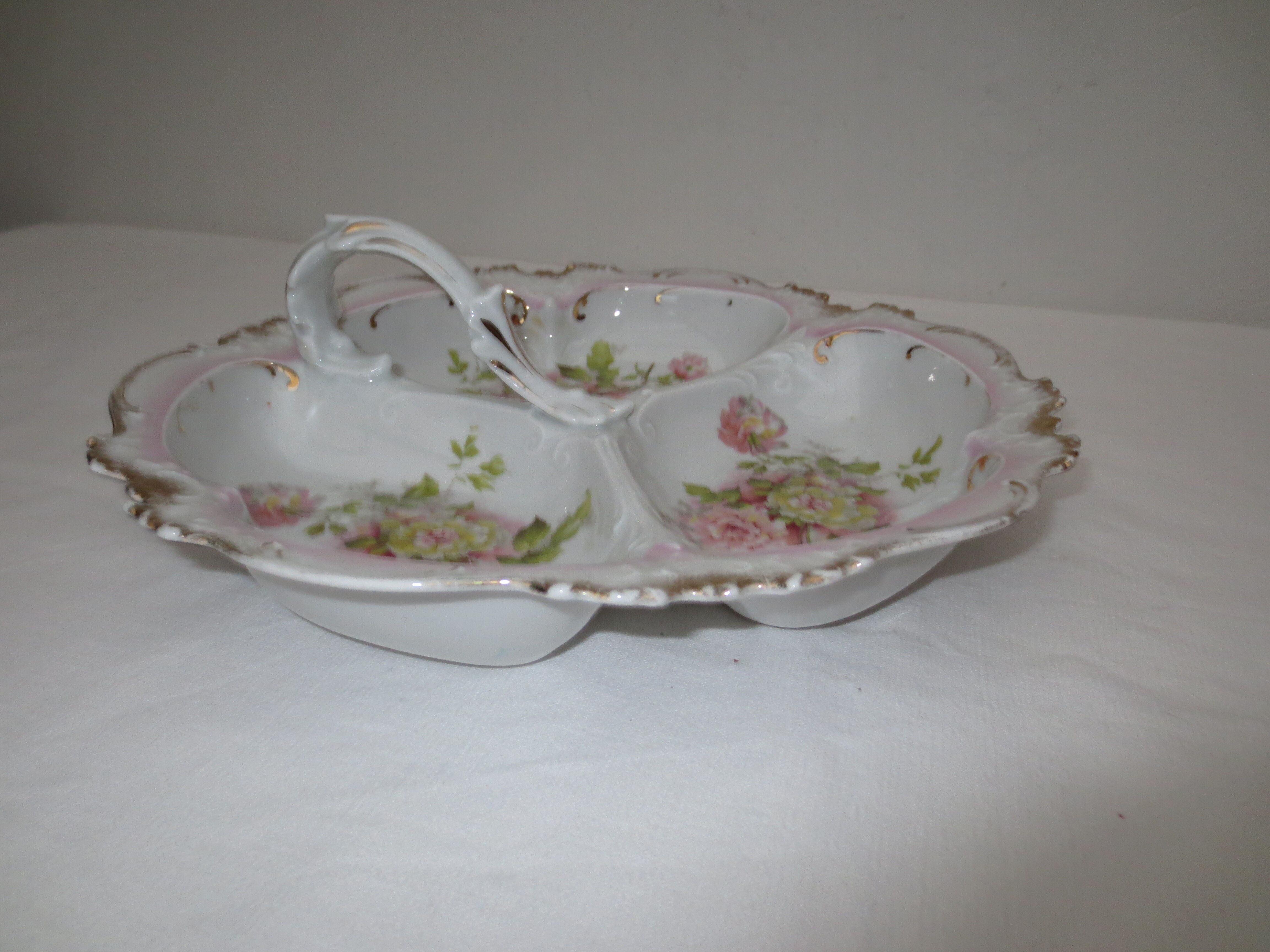 Numbered decorated porcelain quarter dish for hors d'oeuvre or other