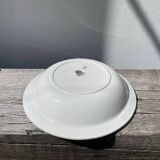 Round, shallow ceramic salad bowl from Saint Amand
