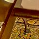 Rectangular wooden table, legs and spacer in hammered ironwork, 60s