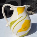 Pitcher with yellow flowers