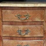 Adorable small veneered chest of drawers.