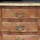 Adorable small veneered chest of drawers.