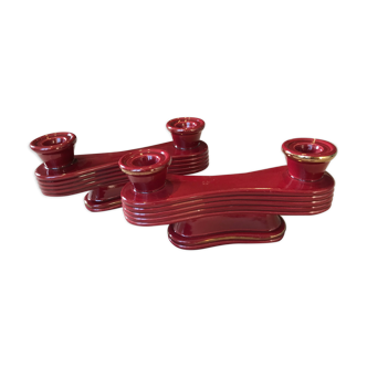Two vintage raspberry candlesticks