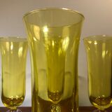 Large transparent yellow champagne flutes