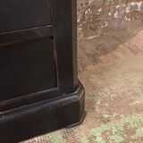 Old black patinated chest of drwers