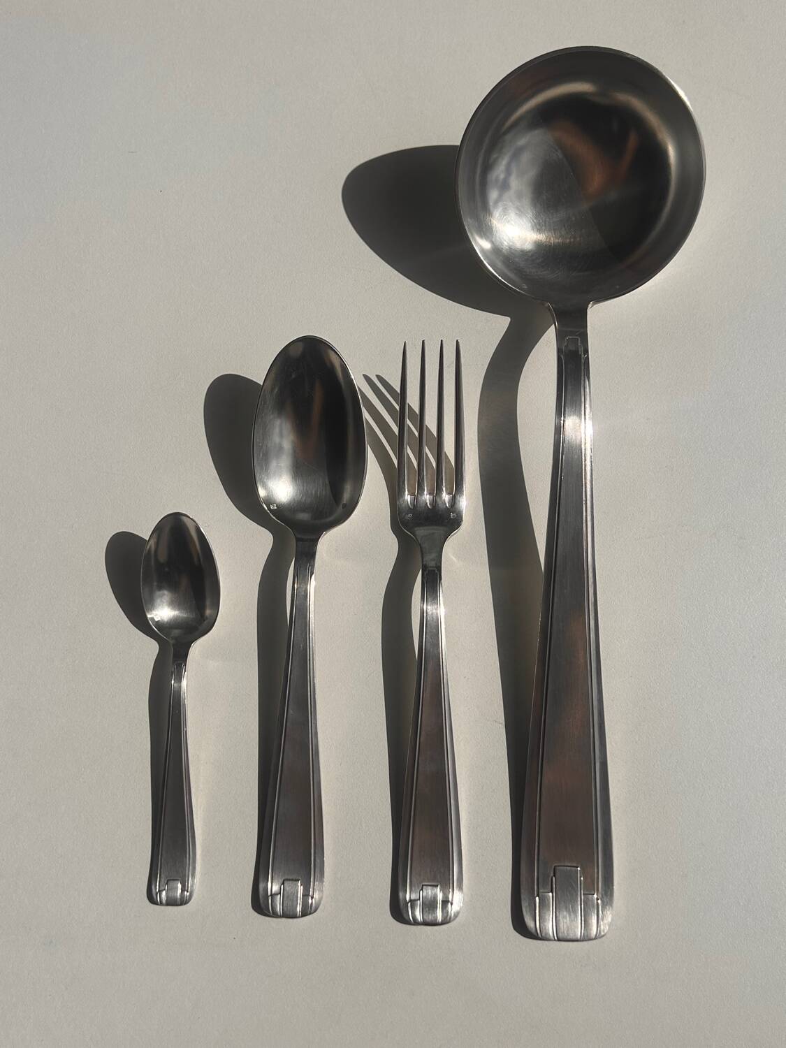 Silver-plated cutlery set by André Blanchet, early 20th century.