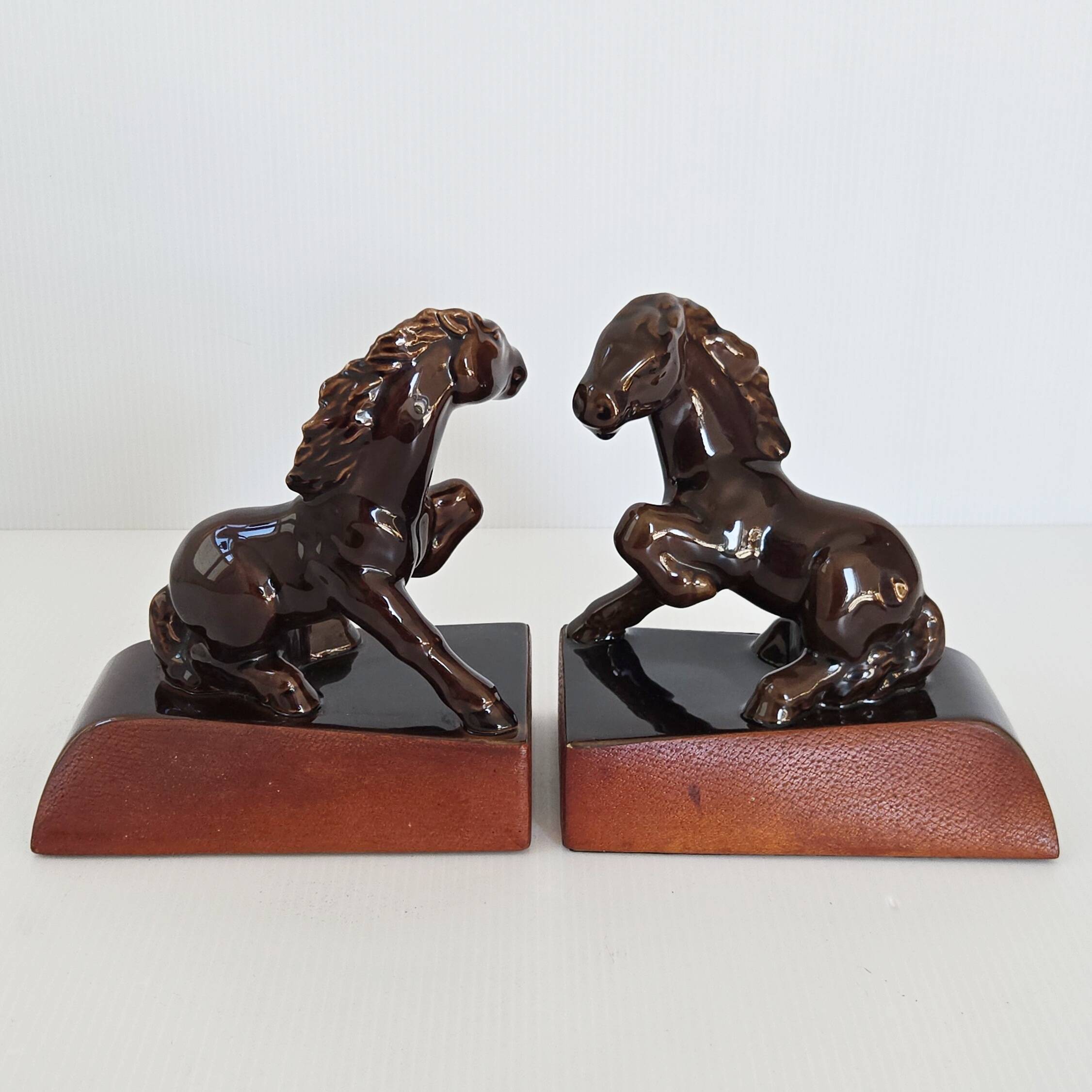 Pair of vintage leather & ceramic bookends