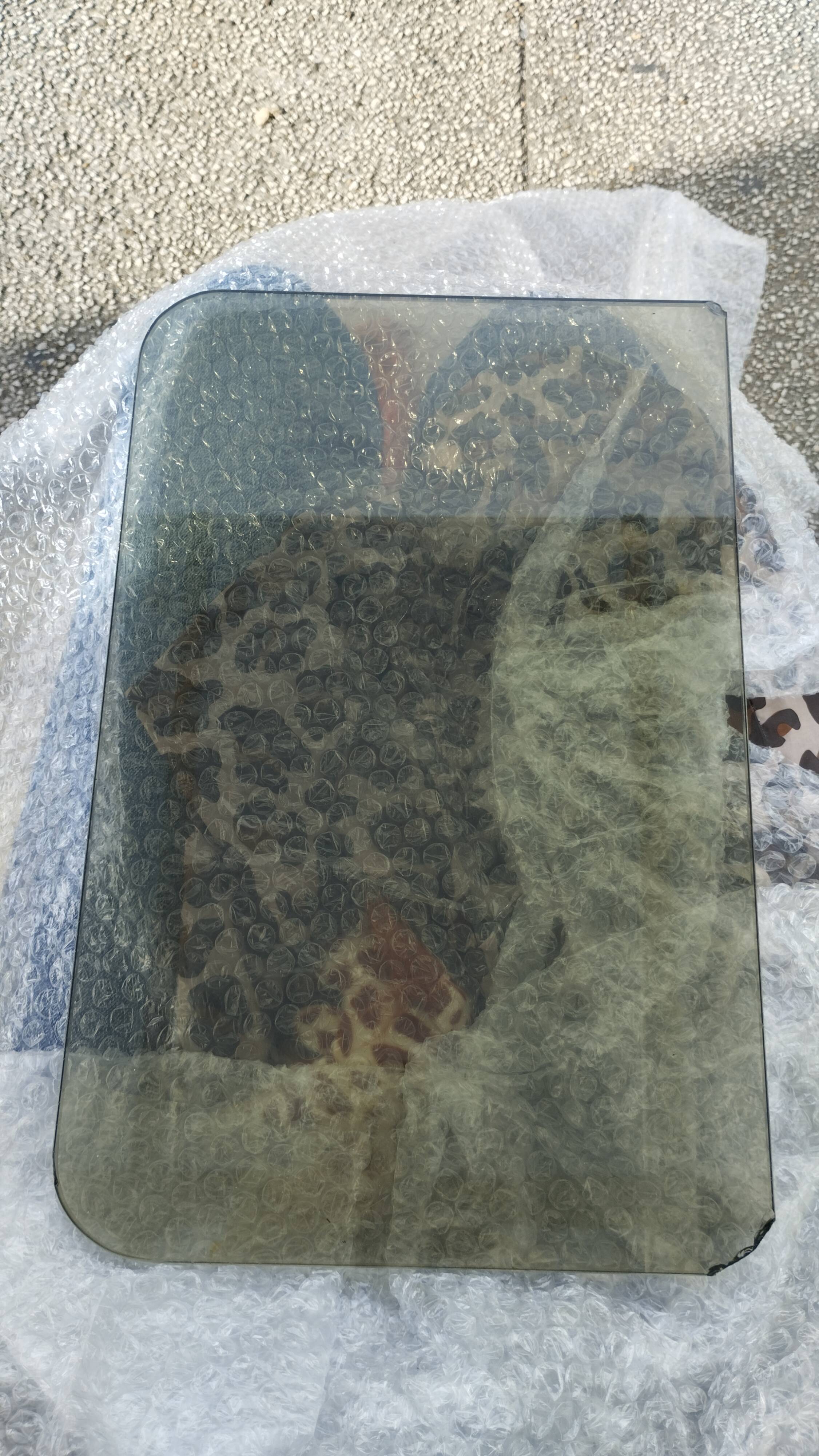 Nesting tables in chrome and smoked glass from the 70s
