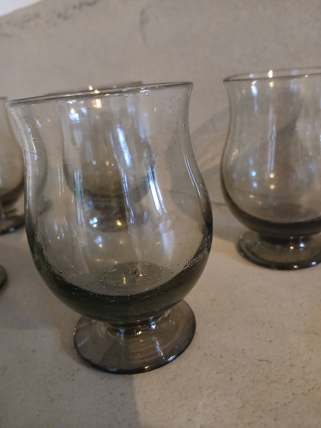 6 old smoked glasses with bubbles