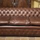 brown leather 3-seater Chesterfield sofa