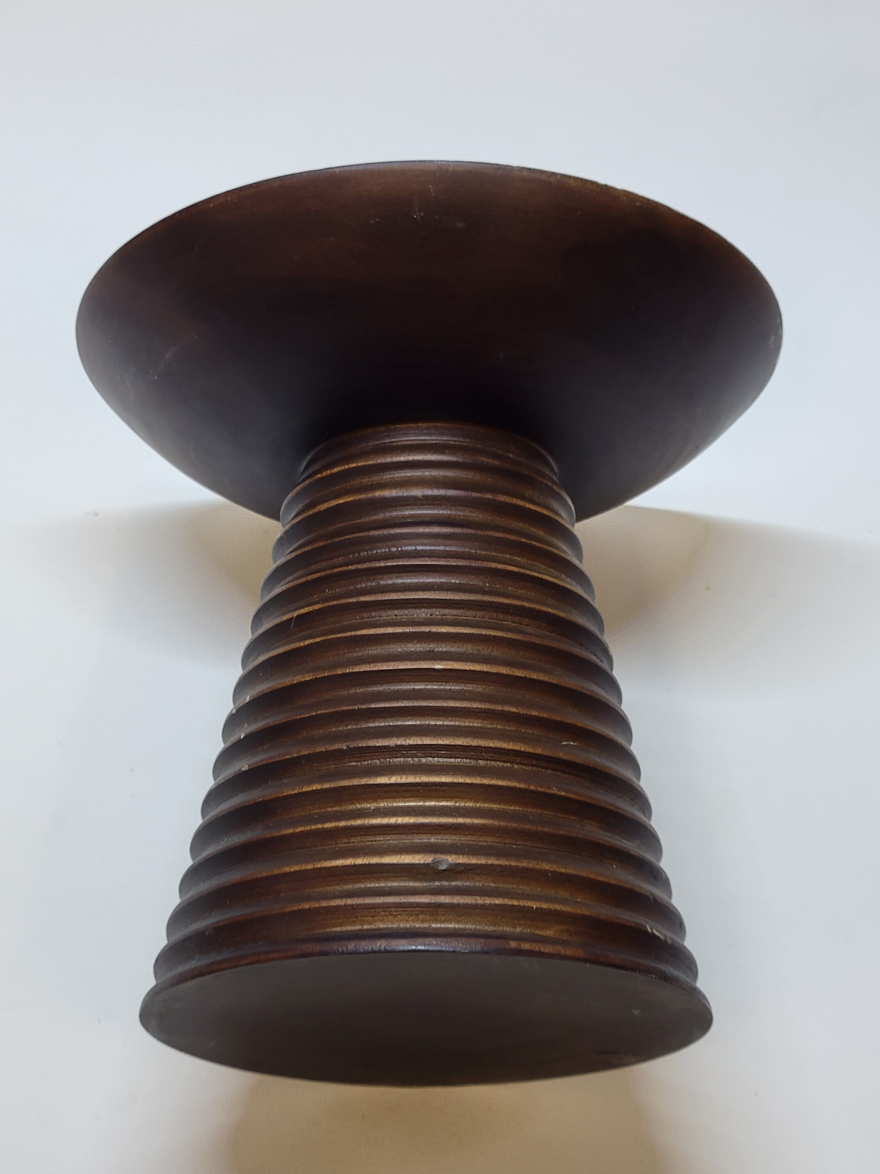 Scandinavian wooden candle holder turned sleek design