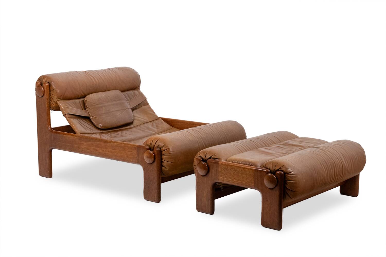Lounge chair and ottoman, in blond elm and leather. 1970s