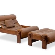 Lounge chair and ottoman, in blond elm and leather. 1970s
