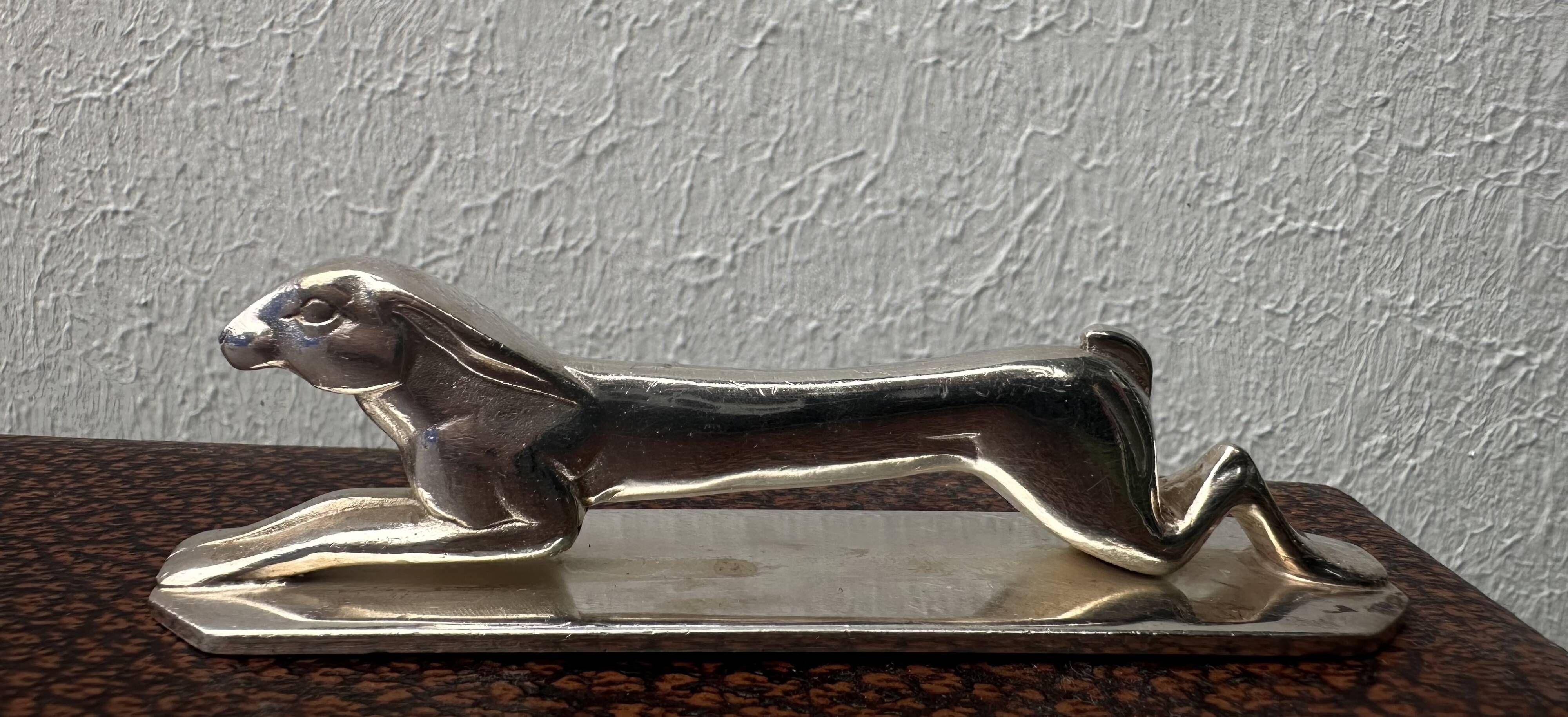 12 antique silver-plated bronze knife rests in modern art deco animal designs.