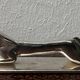 12 antique silver-plated bronze knife rests in modern art deco animal designs.