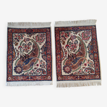 A pair of Persian rugs 70 x 100 cm