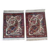 A pair of Persian rugs 70 x 100 cm