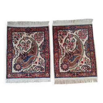 A pair of Persian rugs 70 x 100 cm