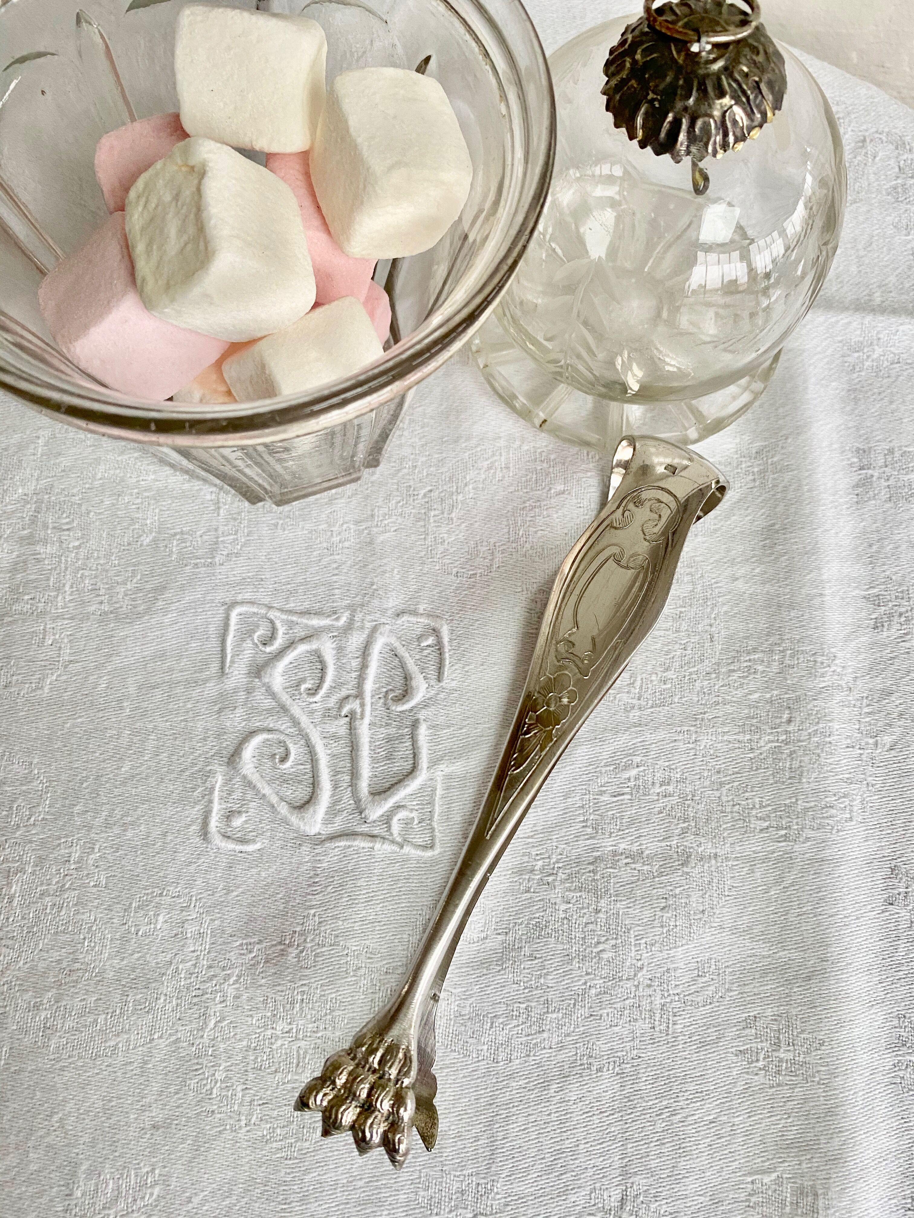 Silver metal sugar tongs