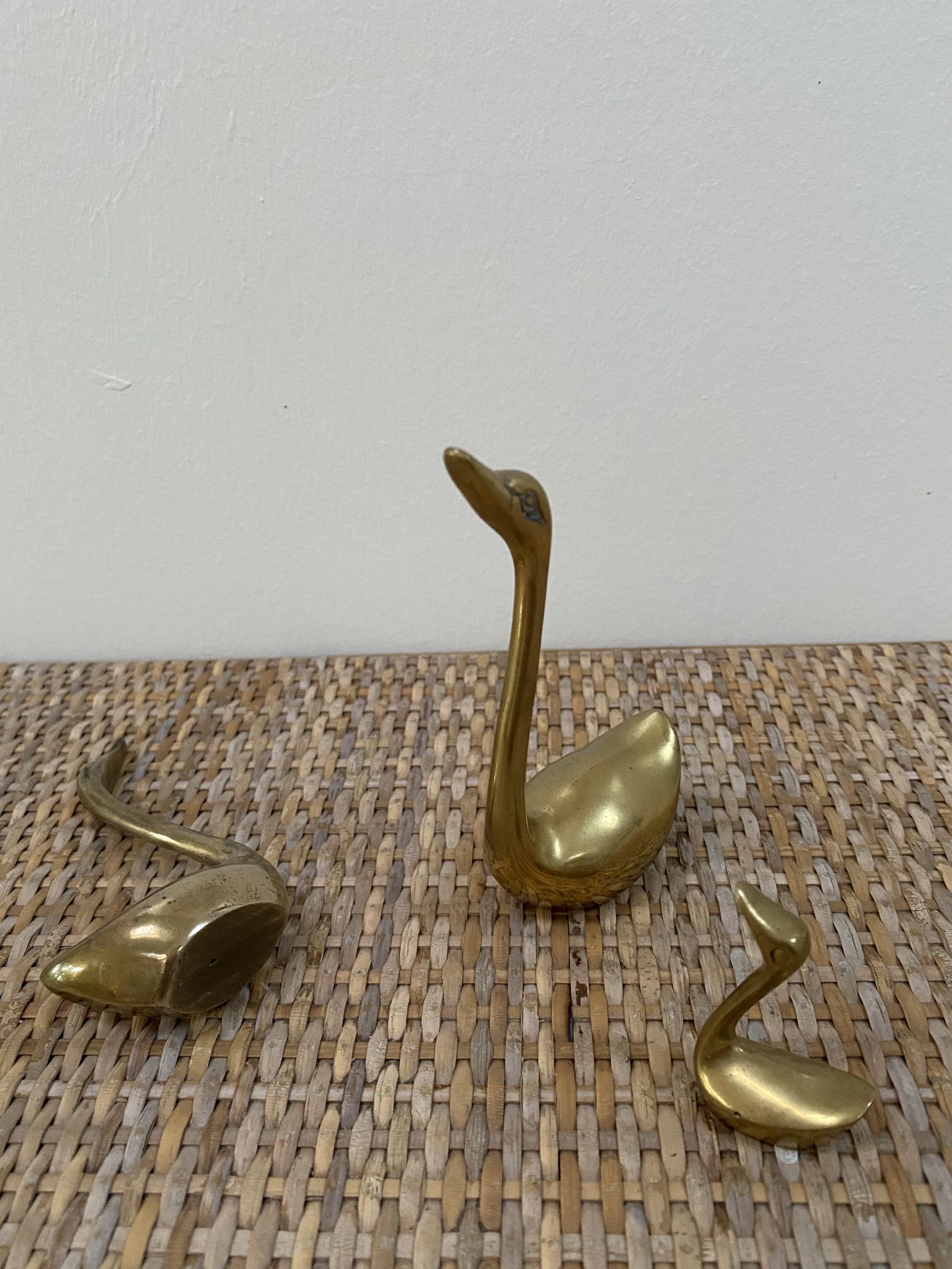 Family of brass swans of the 70s